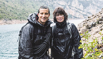 Bear Grylls and Lena Headey in "Running Wild With Bear Grylls"