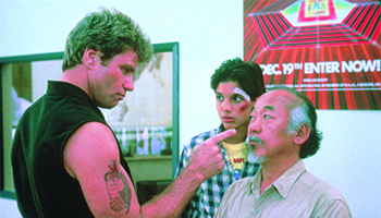 Martin Kove, Ralph Macchio and Pat Morita in "The Karate Kid"