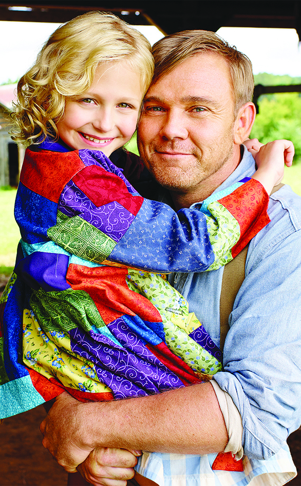 Alyvia Alyn Lind and Ricky Schroder star in "Dolly Parton's Coat of Many Colors"