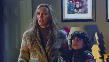 Toni Collette and Emjay Anthony star in "Krampus"